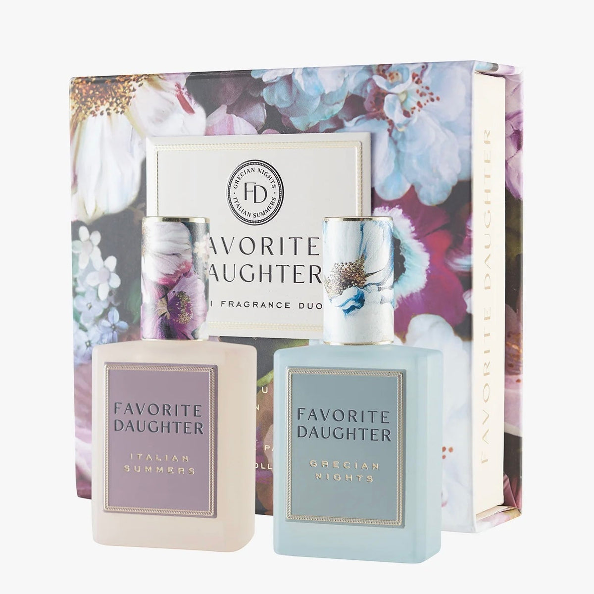 Two bottles of 'Favorite Daughter' fragrance with a floral gift box on a white background