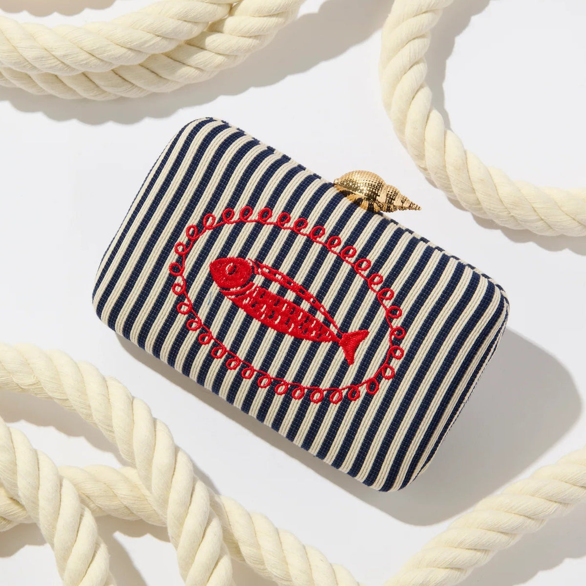 Navy and white striped pouch with red logo on a white background