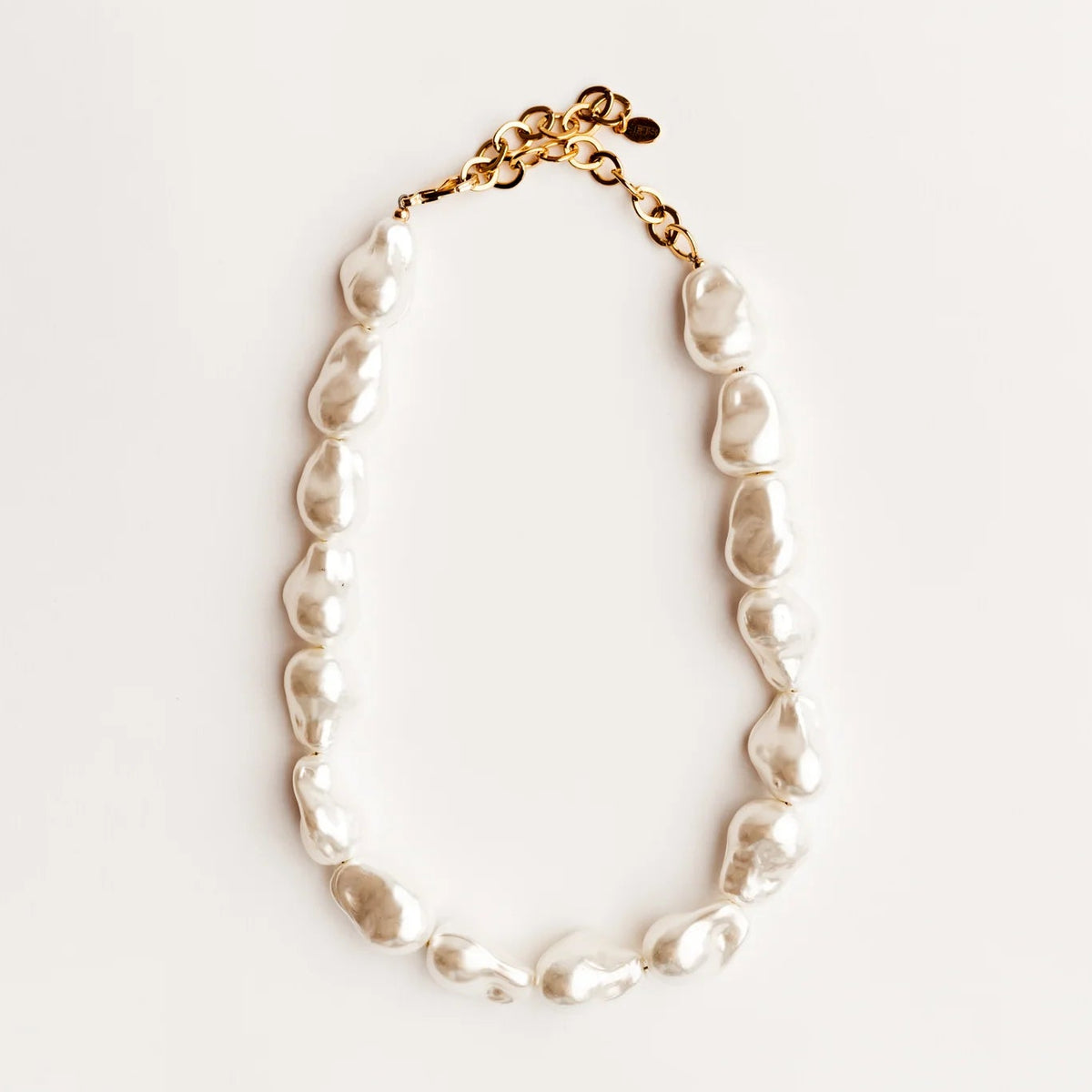Pearl necklace on a white background