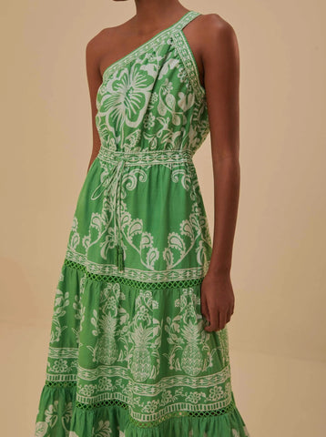 bright green printed dress with one shoulder strap and tiered ruffle skirt