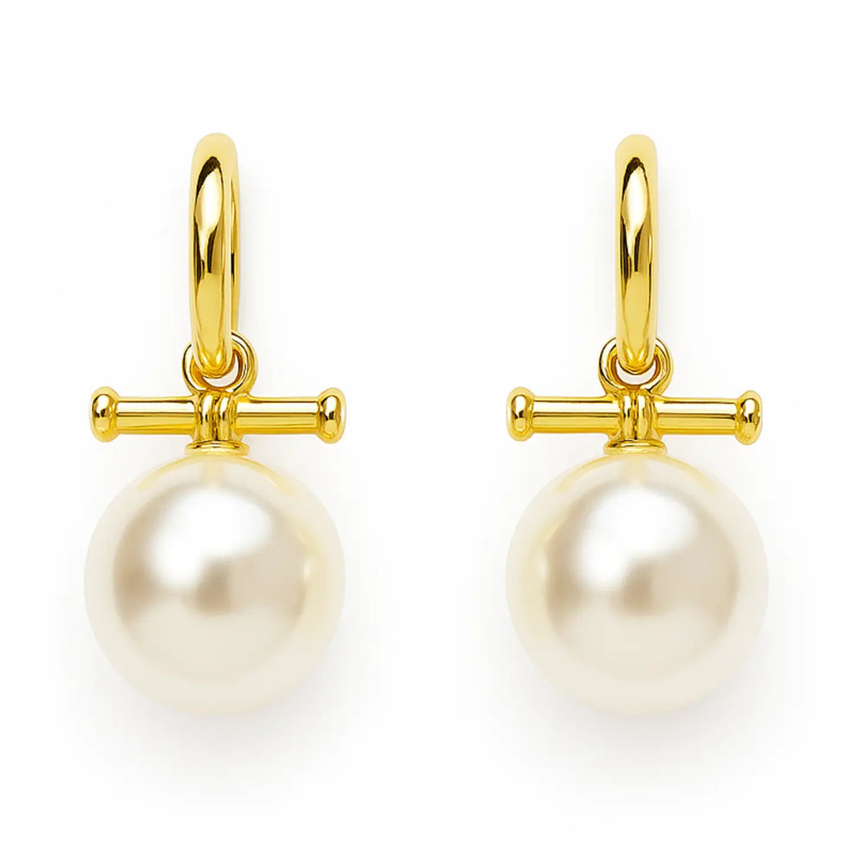 Gold hoop earrings with pearl drops on a white background
