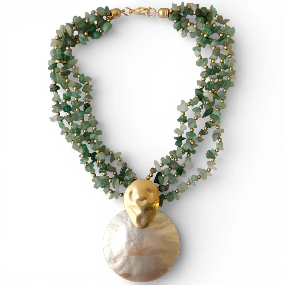 Green beaded necklace with a gold and shell pendant on a white background