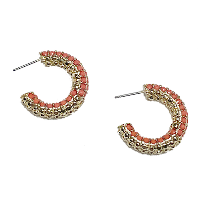 Pair of gold and coral hoop earrings on a white background