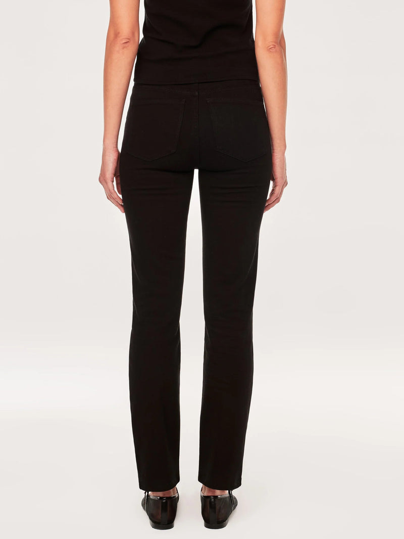 Person wearing a black outfit on a white background